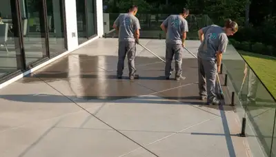 Professional concrete staining on residential garage floor in Detroit, MI by paintersdetroitmi.com