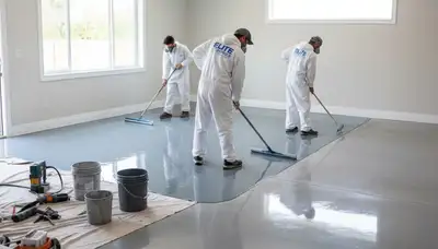 Epoxy floor coating application in Detroit MI garage by professional house painters for lasting durability